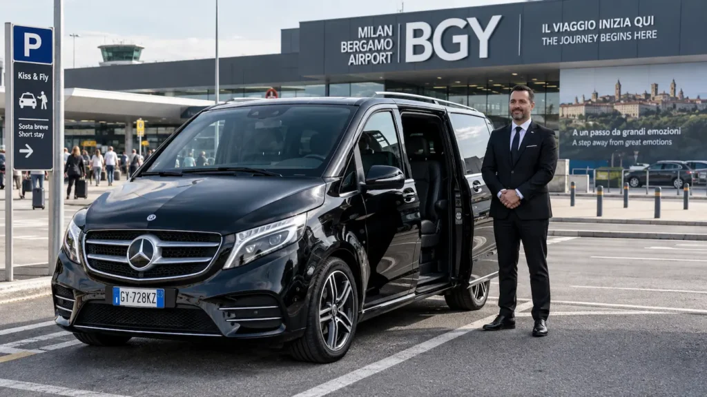 Black Mercedes V-Class minivan with professional driver waiting for clients at Milan Bergamo Airport BGY